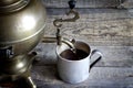 Old retro cup of tea with samovar on vintage table