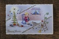 Old retro french postcard with the words Bonne Annee what is translated Happy New Year in French. French Christmas card from the