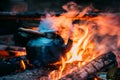 Old Retro Iron Camp Kettle Boiling Water On A Fire In Forest. Royalty Free Stock Photo