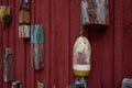 Old retro lobster buoys on the red wall Royalty Free Stock Photo