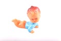 Old, retro plastic squeaky toy for a small child on a white background