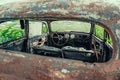 Old retro rusty abandoned car view inside Royalty Free Stock Photo