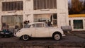 Old retro Saab in front of vintage BP Gasstation in Tingvoll in Norway