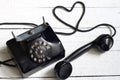 Old retro telephone with heart shape abstract