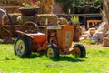 an old retro tractor as a agriculture vehicle