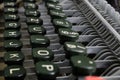 Old retro typewriter with mechanical keyboard with alphabet