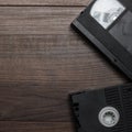 Old retro video tapes on wooden background Royalty Free Stock Photo