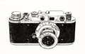 Old retro vintage photo small format 135 film rangefinder camera with lens