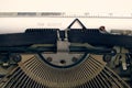 Old retro vintage typewriter. A white sheet with the printed text top secret