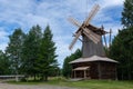 Old retro wooden mill stands on the edges of the forest Royalty Free Stock Photo