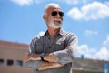 Old rich man with sun glasses and beard on street portrait Royalty Free Stock Photo