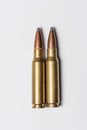 Old rifle bullets on white background Royalty Free Stock Photo