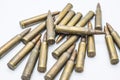 Old rifle cartridges 5.56 mm on a white background Royalty Free Stock Photo