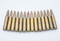 Old rifle cartridges 5.56 mm on a white background Royalty Free Stock Photo