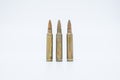 Old rifle cartridges 5.56 mm on a white background Royalty Free Stock Photo