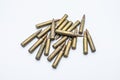 Old rifle cartridges 5.56 mm on a white background Royalty Free Stock Photo