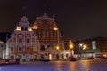 Old Riga the capital of Latvia at night. House of Blackheads in the Town Hall Square and the spire of the Cathedral in the Royalty Free Stock Photo