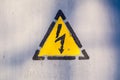 Old risk of electric shock triangle sign Royalty Free Stock Photo