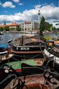 Berlin, Spree river, Germany. Old river ships at the embankment