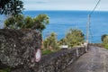 Old road down the hill with an Atlantic Ocean view Royalty Free Stock Photo