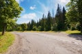 old road leads through a peaceful countryside