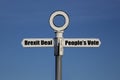 Old road sign with Brexit deal and people`s vote on opposite sides Royalty Free Stock Photo