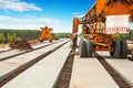 Old roadworking mashines on bridge under construction Royalty Free Stock Photo