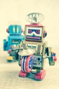 Old robot toy on wood table Royalty Free Stock Photo