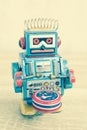 Old robot toy on wood table Royalty Free Stock Photo