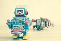 Old robot toy on wood table Royalty Free Stock Photo