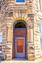 Old rock theater built in 1928  in Fairfax Oklahoma USA boarded up corner arched entrance because the roof of the building was Royalty Free Stock Photo