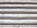 The old rolling shutters are dirty and rusting. Royalty Free Stock Photo