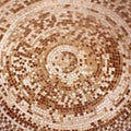 Old roman beige and brown mosaic ceramic tiles in circle pattern Royalty Free Stock Photo