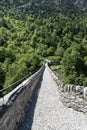 Old roman path on a bridge near a mountain in italy Royalty Free Stock Photo