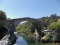 Old Roman stone bridge in Cangas de Onis Asturias, Spain. Royalty Free Stock Photo