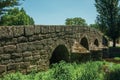 Old Roman stone bridge over the Sever River in Portagem Royalty Free Stock Photo