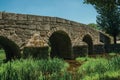 Old Roman stone bridge over the Sever River in Portagem Royalty Free Stock Photo