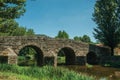 Old Roman stone bridge over the Sever River in Portagem Royalty Free Stock Photo