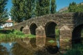 Old Roman stone bridge over the Sever River in Portagem Royalty Free Stock Photo