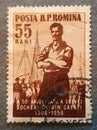 an old Romanian postage stamp 1956 with the 50th anniversary of the dockers' strike in Galati Royalty Free Stock Photo