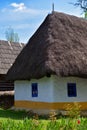 Old romanian traditional village clay and reed house Royalty Free Stock Photo