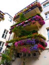 Old romantic balcony with flowers in the center of Warsaw