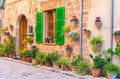 Old romantic house with potted flowers and plants Royalty Free Stock Photo