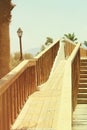 old romantic wooden bridge over tropical landscape. Summer travel and vacation concept