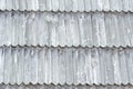 Old roof is made of wooden tiles. Texture. Close-up Royalty Free Stock Photo