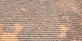 Old roof with odd rooftiles Royalty Free Stock Photo