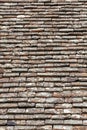 Old roof tiles background of a stone clay brick pattern and orange red texture Royalty Free Stock Photo