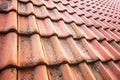 Old roof tiles texture. Rustic roofing tile