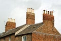 Old roof top with chimney pots on an English house. UK Royalty Free Stock Photo