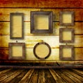 Old room, grunge interior with frames Royalty Free Stock Photo